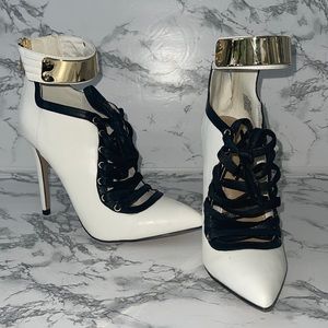 White, black and gold front lace up back heel zipper 4” heels.